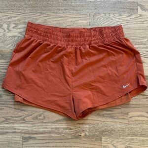 Nike Women's Rust Burnt Orange Athletic Shorts XL with liner